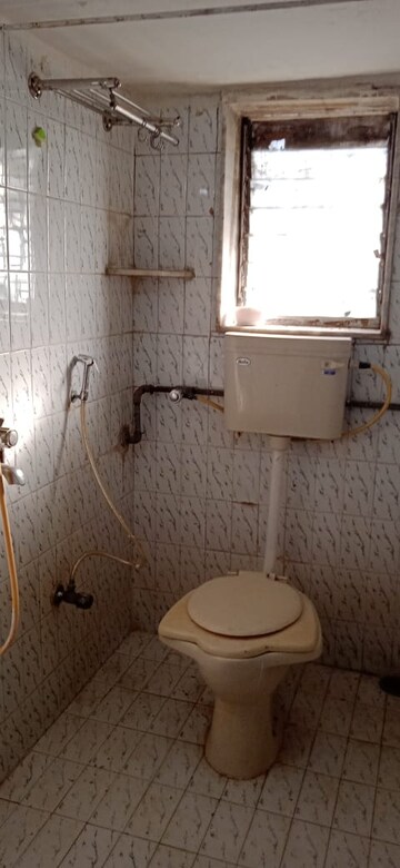 Bathroom in 1 BHK Apartment at Ahimsa Marg, Malad West – for Rent