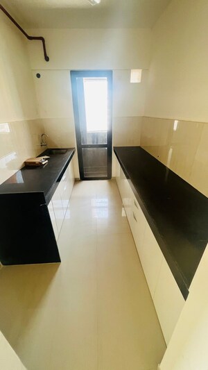 Kitchen in 2 BHK Apartment at Shapoorji Pallonji Joyville, Virar West – for Sale