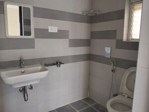 Bathroom in 3 BHK Apartment at Vajras Jasmine County, Puppalaguda – for Rent