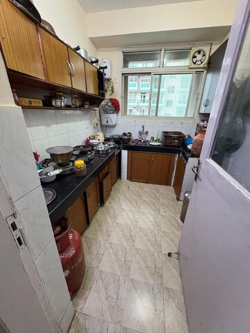 Kitchen in 2 BHK Apartment at Ansal Valley View Estate, Gwal Pahari – for Rent