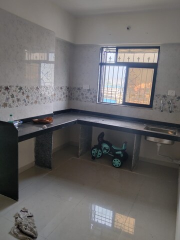 Kitchen in 1 BHK Apartment at Raj Tulsi City, Badlapur East – for Rent