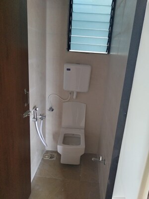 Bathroom in 1 BHK Apartment at Raj Tulsi City, Badlapur East – for Rent