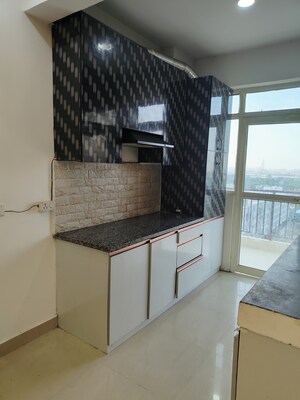 Kitchen in 2 BHK Apartment at Suncity Avenue 76, Sector 76 – for Rent