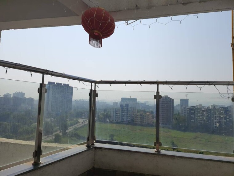 Balcony, zinnia-elegans 1 Bedroom 628 Sq.Ft. Apartment In Wakad Pune 9220416