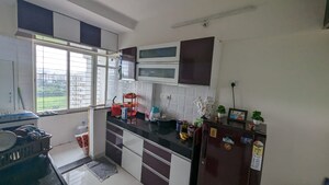 Kitchen in 1 BHK Apartment at Zinnia Elegans, Wakad – for Rent