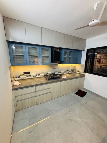 Kitchen in 2 BHK Apartment at Unique Youtopia, Kharadi – for Rent