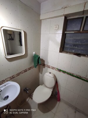 Bathroom in 1 BHK Apartment at Ajmera Odyessey Apartment, Bhakti Park – for Rent