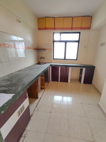 Kitchen in 2 BHK Apartment at Mohan Regency, Kalyan West – for Rent