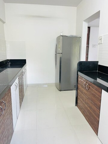 Kitchen in 2 BHK Apartment at Akal CHS, Andheri East – for Sale