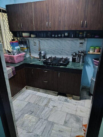 Kitchen in 2 BHK Apartment at Windsor and Nova Society, Ahinsa Khand 2 – for Sale