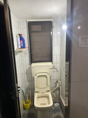 Bathroom in 1 BHK Apartment at Sai Prasad CHS, Andheri East – for Rent