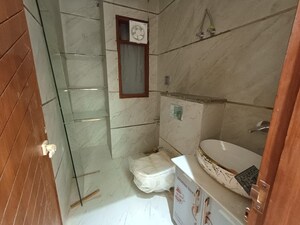 Bathroom in 4 BHK Builder Floor at Vasundhara Sector 3 – for Sale