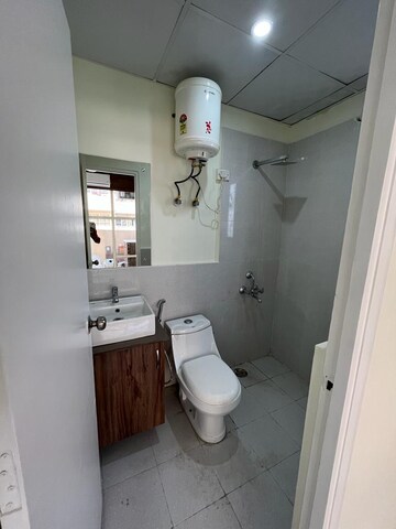 Bathroom in 3 BHK Apartment at Breez Global Heights, Sohna Sector 33 – for Rent