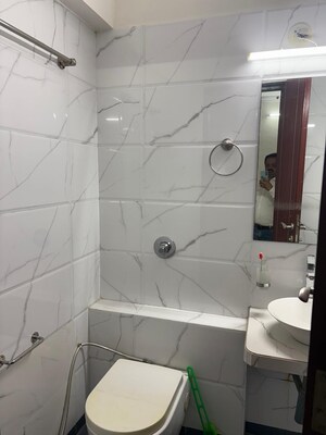 Bathroom in 4 BHK Apartment at Andheri East – for Rent