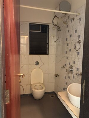 Bathroom in 4 BHK Apartment at Andheri East – for Rent