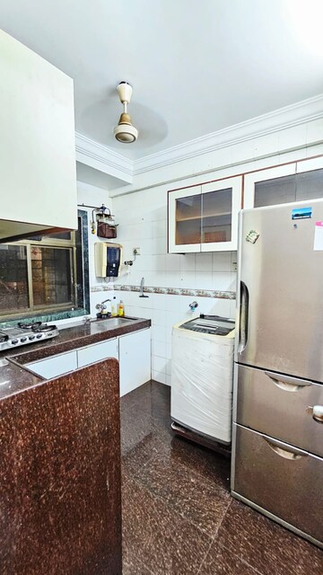 Kitchen in 2 BHK Apartment at Ashok Avenue Marol, Marol – for Rent