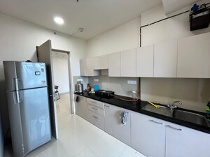 Kitchen in 2 BHK Apartment at Hiranandani Fortune City, New Panvel – for Rent