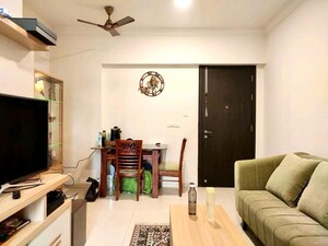 Living Room in 1 BHK Apartment at Hiranandani Fortune City, New Panvel – for Rent