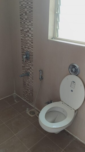 Bathroom in 2 BHK Apartment at Majestique Landmark Miami, Dhayari – for Rent