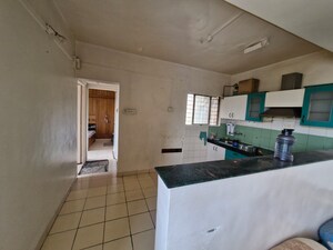 Kitchen in 2 BHK Apartment at Karan Ashiyana, Wadgaon Sheri – for Rent