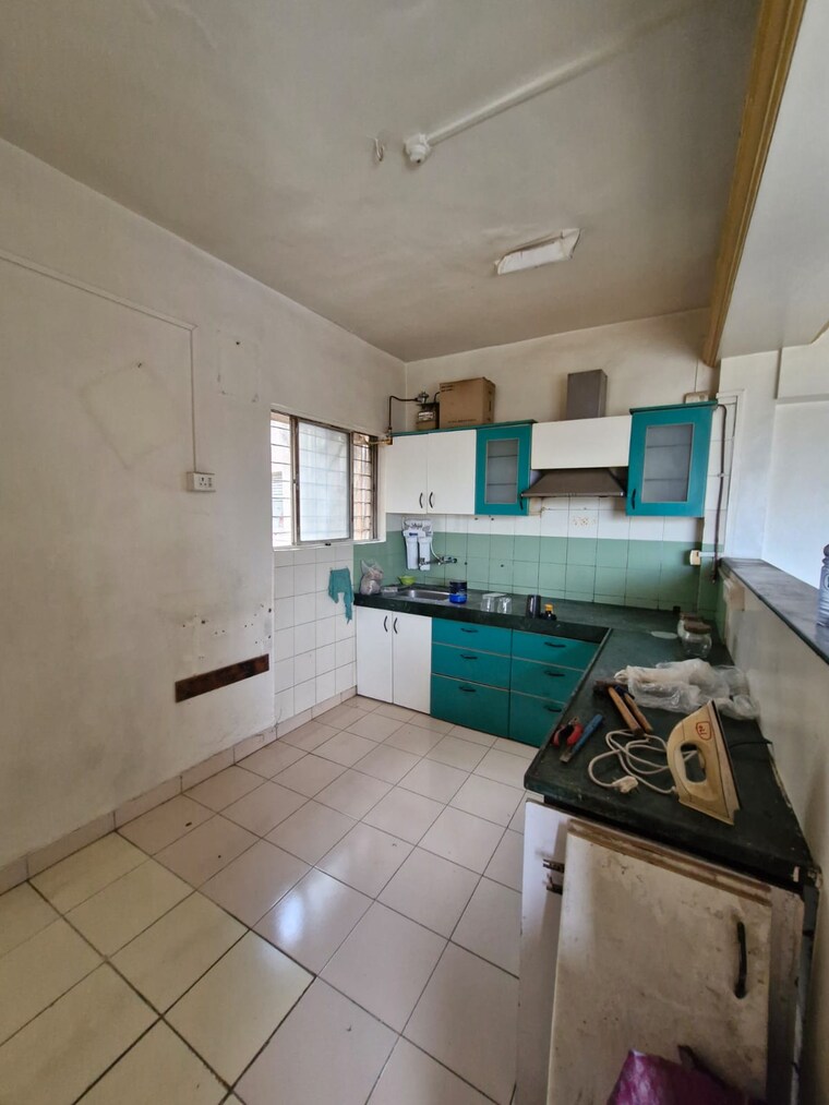 Kitchen, karan-ashiyana 2 Bedroom 813 Sq.Ft. Apartment In Wadgaon Sheri Pune 9221252