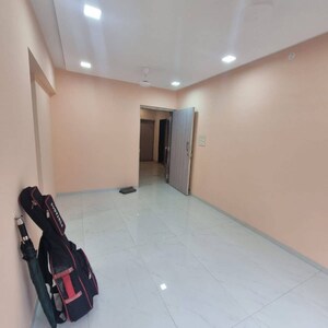 Living Room in 1 BHK Apartment at Parimal CHS Malad East, Pethe Nagar – for Rent