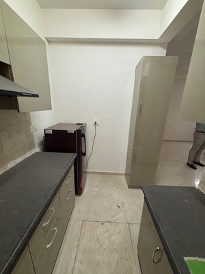 Kitchen in 2 BHK Apartment at Signature The Millennia 2, Sector 37d – for Rent
