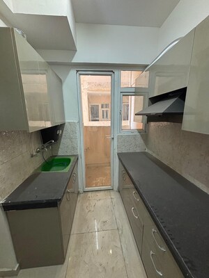 Kitchen in 2 BHK Apartment at Signature The Millennia 2, Sector 37d – for Rent