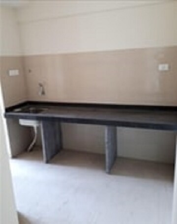 Kitchen in 2 BHK Apartment at Bharat Ecovistas, Shilphata – for Sale