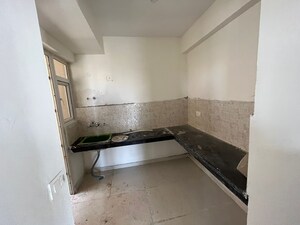 Kitchen in 2 BHK Apartment at Signature The Millennia 2, Sector 37d – for Rent