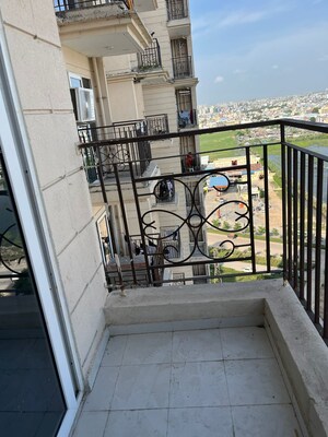 Balcony in 2 BHK Apartment at Signature The Millennia 2, Sector 37d – for Rent