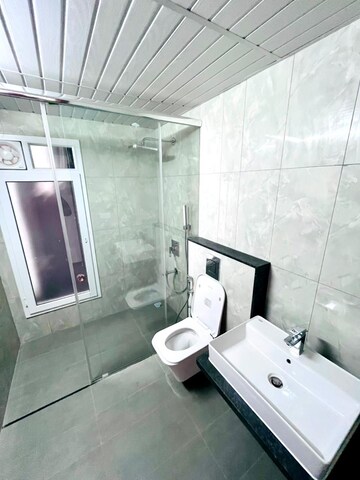 Bathroom in 4 BHK Apartment at L&T Raintree Boulevard, Hebbal – for Rent