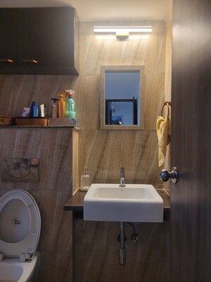 Bathroom in 2 BHK Apartment at Lodha Amara, Kolshet Road – for Rent