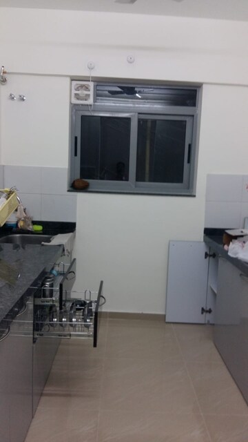 Kitchen in 2 BHK Apartment at Amanora Future Towers, Hadapsar – for Sale