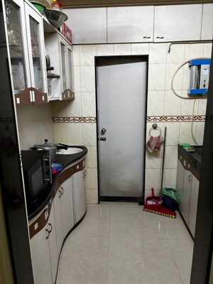 Kitchen in 1.5 BHK Apartment at Vile Parle West – for Rent