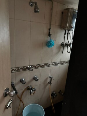 Bathroom in 1.5 BHK Apartment at Vile Parle West – for Rent