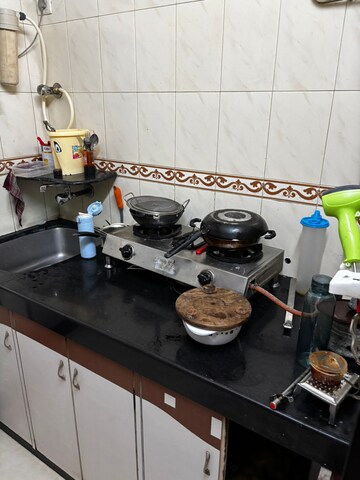 Kitchen in 1.5 BHK Apartment at Vile Parle West – for Rent