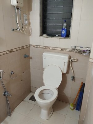 Bathroom in 2 BHK Apartment at New Heritage CHS, Dahisar West – for Rent