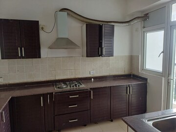 Kitchen in 3 BHK Apartment at Ashiana Palm Court, Raj Nagar Extension – for Sale