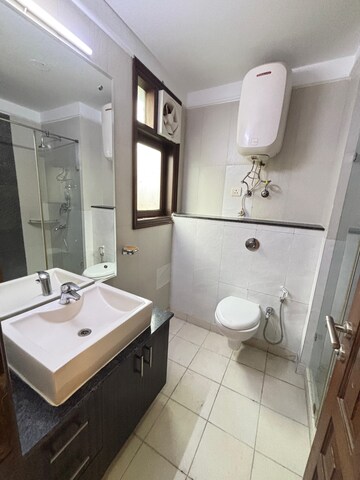 Bathroom in 4 BHK Builder Floor at Saket – for Rent