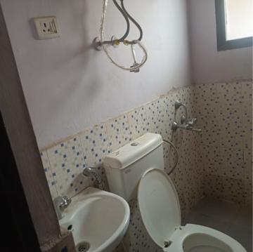 Bathroom in 2 BHK Apartment at Apex Our Homes, Garoli Kalan – for Rent