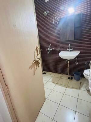 Bathroom in 5 BHK Apartment at UPAVP Ganga Yamuna And Hindon Enclave, Pratap Vihar – for Sale