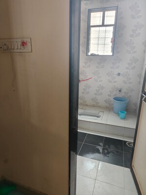 Bathroom in 2 BHK Apartment at Greenland Society, Pimple Saudagar – for Sale
