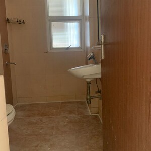 Bathroom in 3 BHK Apartment at Ramprastha City The Atrium, Sector 37d – for Rent