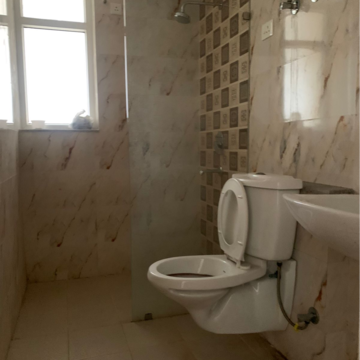 Bathroom in 3 BHK Apartment at Ramprastha City The Edge Towers, Sector 37d – for Rent