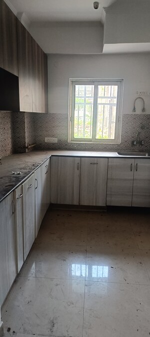 Kitchen in 2 BHK Apartment at Gardenia Golf City, Sector 75 – for Rent