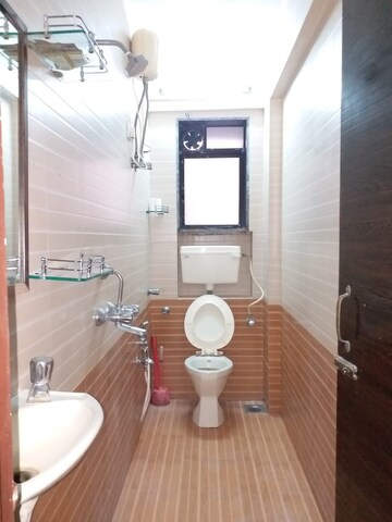 Bathroom in 1 BHK Apartment at Gulab CHS, Pali Hill – for Rent