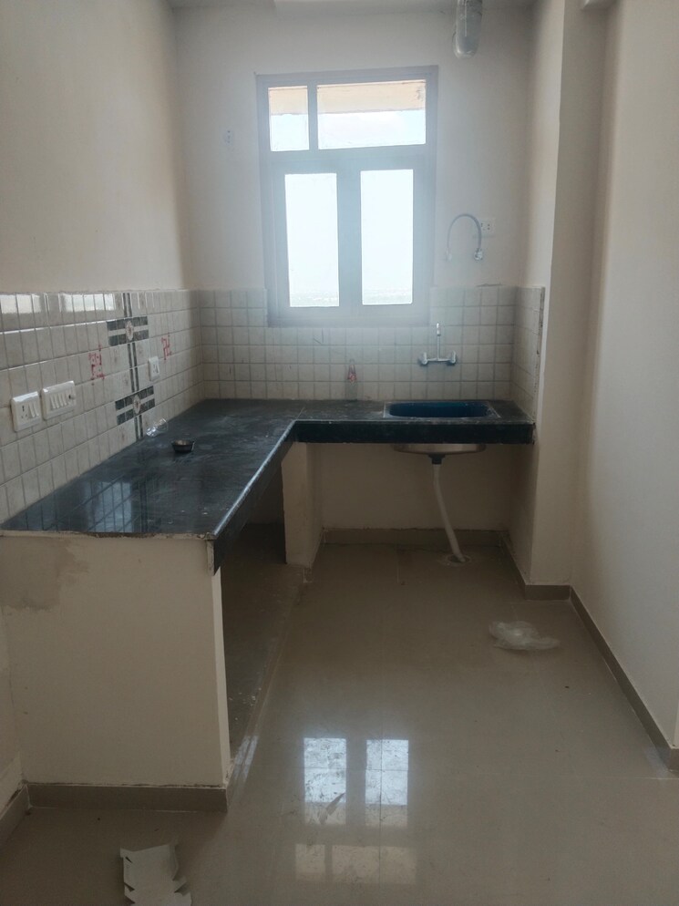 Kitchen, pareena-om-apartments 2 Bedroom 647 Sq.Ft. Apartment In Sector 112 Gurgaon 9221833