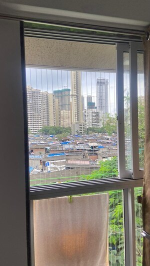 Room in 2 BHK Apartment at Atul Blue Empire, Kandivali West – for Sale