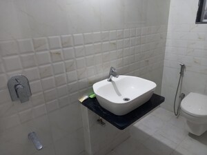 Bathroom in 3 BHK Apartment at Kundan Presidia, Nibm Road – for Rent